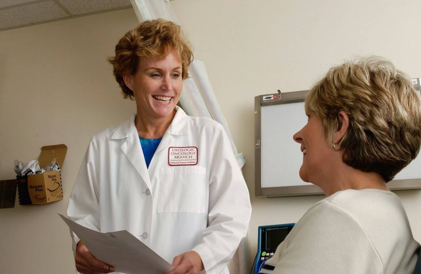 Physician consulting with a healthcare colleague